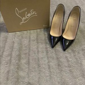 Christian Louboutin patent leather pumps black.